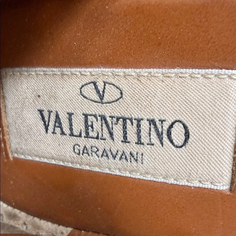 These are Valentino Garavani Rockstud textured-leather espadrille wedge heel